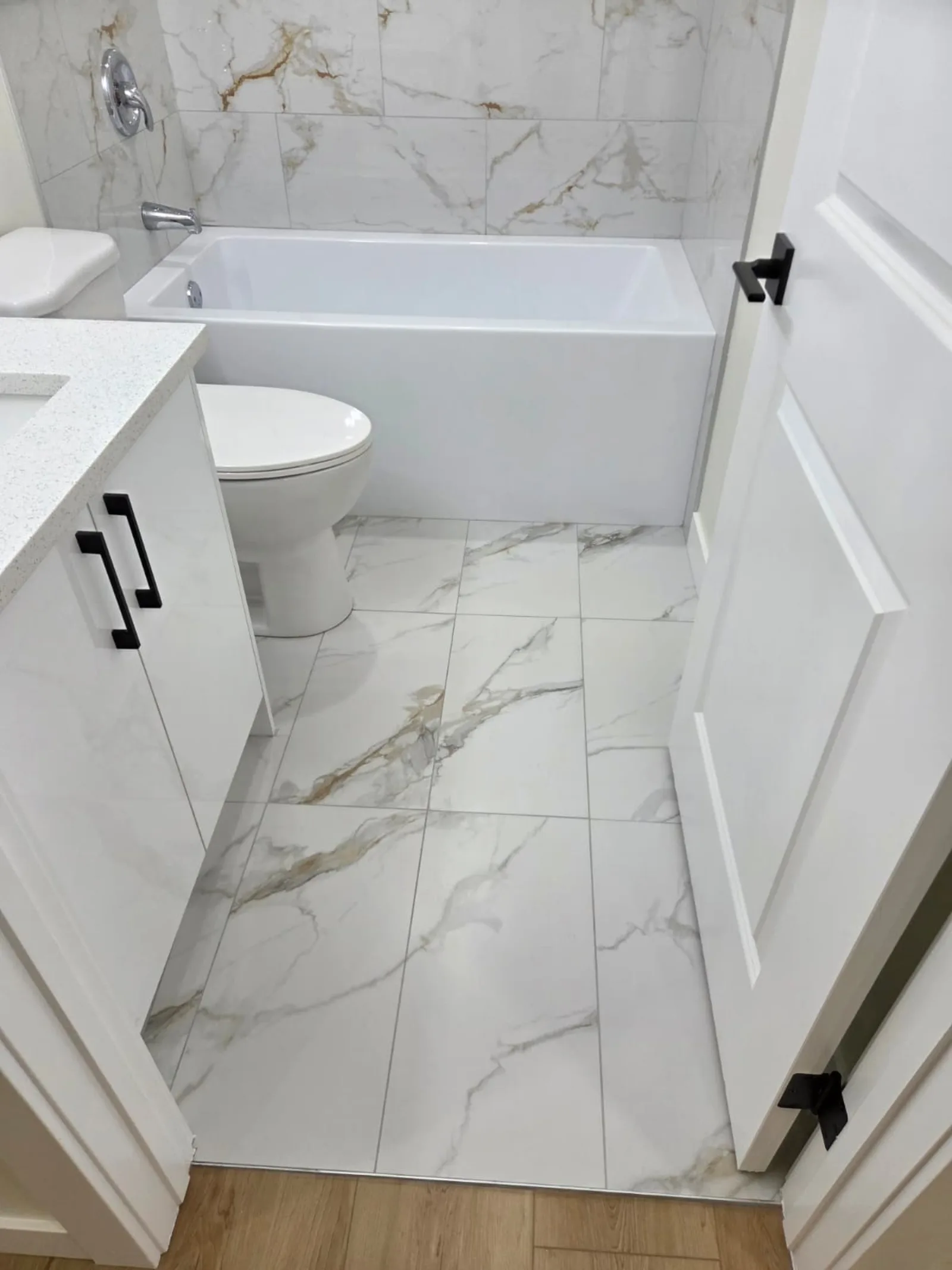 Modern kitchen renovation with quartz countertops and new cabinetry, Calgary