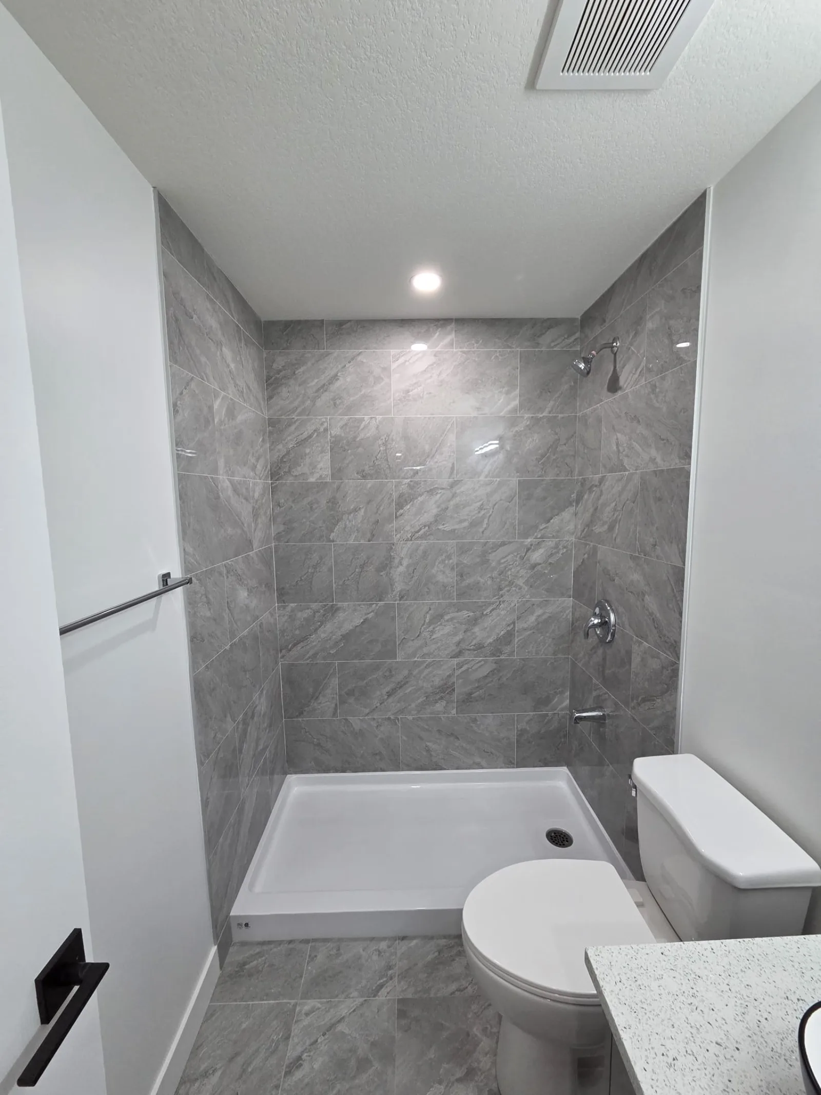 Egress window installation in basement bedroom, Calgary